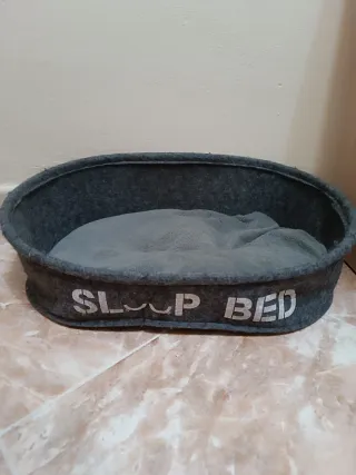 Cama ovalada para mascotas gris