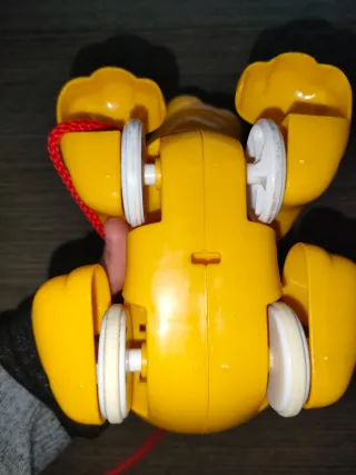 Pluto Baby, juguete arrastre con Movimiento y soni