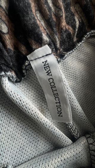 Pantalón ancho estampado “New Collection”