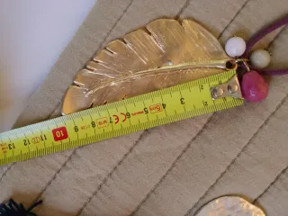 Colgantes dorado y plateado precio unidad