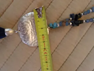 Colgantes dorado y plateado precio unidad