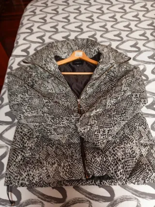 Plumas animal print súper abrigada