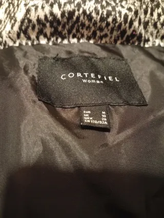 Plumas animal print súper abrigada