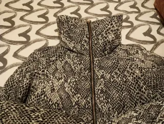 Plumas animal print súper abrigada