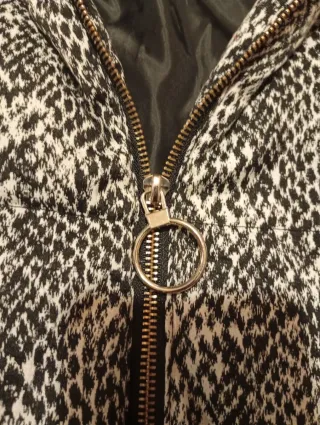 Plumas animal print súper abrigada