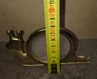 Caracol de latón con espejo