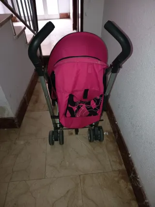 Silla de paseo Cybex rosa y negra