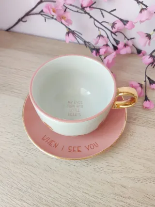 Taza y plato rosa dorado con conejillo de indias