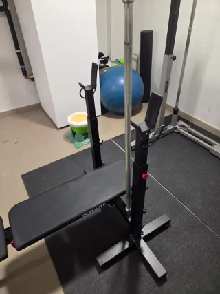 Banco de pesas con barra