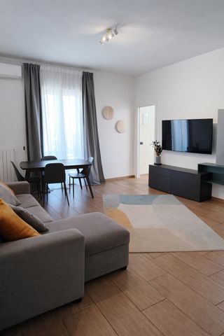 Prestigioso Trilocale Ristrutturato con Posto Auto