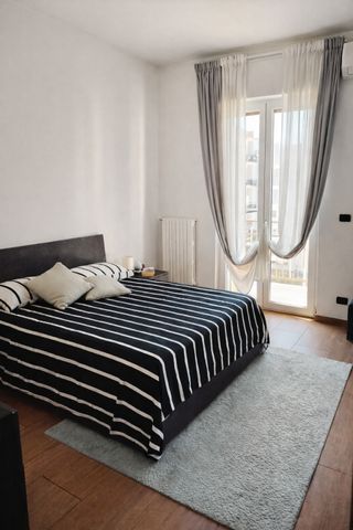 Prestigioso Trilocale Ristrutturato con Posto Auto