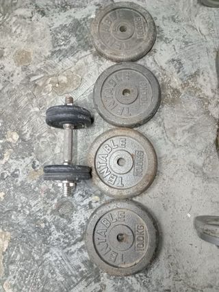 Pesas y barras de gimnasio