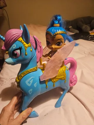 Muñeca y unicornio Shimmer y Unicornio