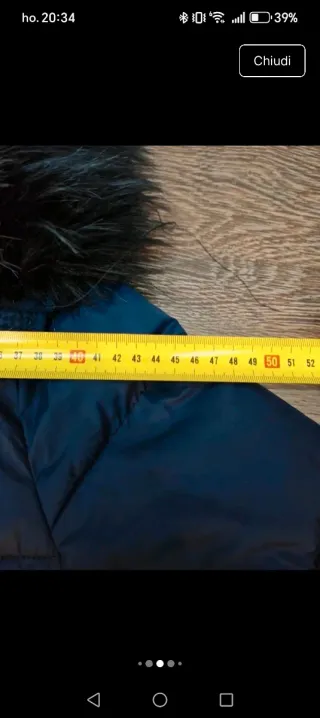 Piumino blu con cappuccio e pelliccia