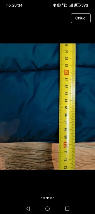 Piumino blu con cappuccio e pelliccia