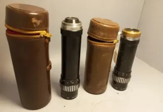 Caja de lentes de cine antiguas y tapas