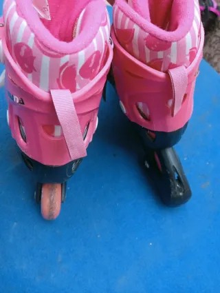 Patines en línea rosas y negros talla 30-33