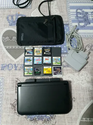 Nintendo 3DS XL + base ricarica + giochi