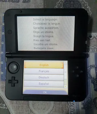 Nintendo 3DS XL + base ricarica + giochi