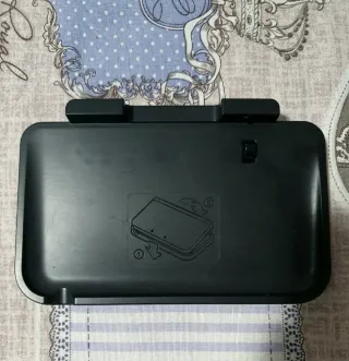 Nintendo 3DS XL + base ricarica + giochi
