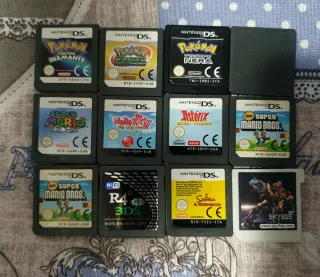 Nintendo 3DS XL + base ricarica + giochi