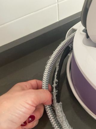 Plancha de vapor Braun con centro de planchado