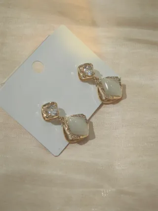 Orecchini pendenti geometrici occhio di gatto