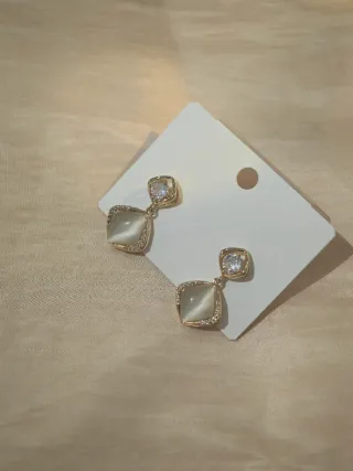 Orecchini pendenti geometrici occhio di gatto