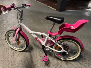 Bicicleta infantil rosa y blanca