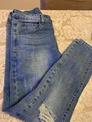 Jeans chiari strappati taglia 44