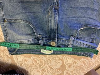 Jeans chiari strappati taglia 44