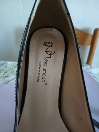 Décolleté nere con fiocco