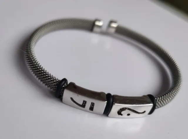 Pulseras plata y cuero verde