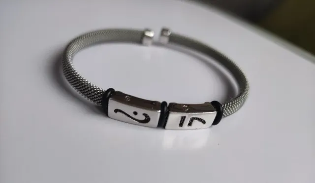 Pulseras plata y cuero verde