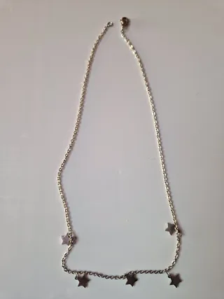 Colgante de plata con estrellas