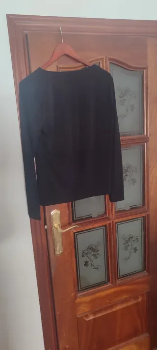 Camiseta H&M Negra Talla M sin usar .