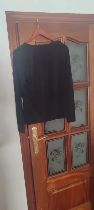 Camiseta H&M Negra Talla M sin usar .