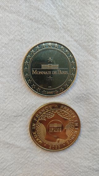 Lote Monedas N° 11 y 28 original Disneyland París