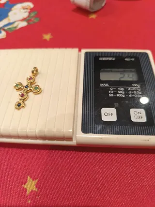 Cruz Oro 18 kilates con piedras preciosas