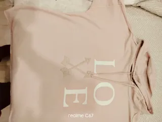 Sudadera rosa con capucha y estampado LOVE