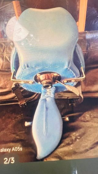 Silla de peluqueria para niño.