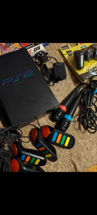 Consola PS2 con juegos y accesorios