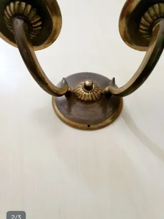 Candelabro de pared de bronce