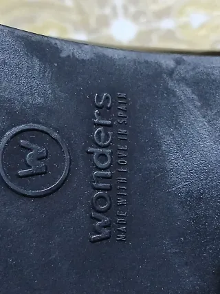 Zapatos de tacón marrones con flecos