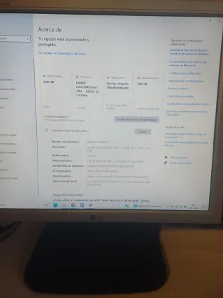 Ordenador HP pantalla teclado altavoces y mesa con