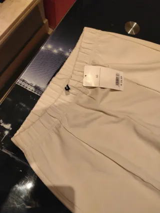 Pantalones anchos Calzedonia crema nuevos