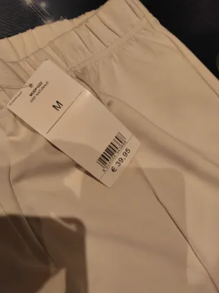 Pantalones anchos Calzedonia crema nuevos