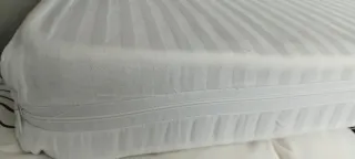 Cuna de viaje con adaptador de altura