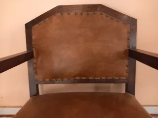 Poltrona vintage in pelle e legno