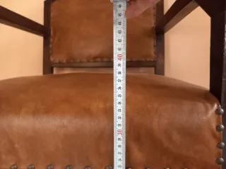 Poltrona vintage in pelle e legno